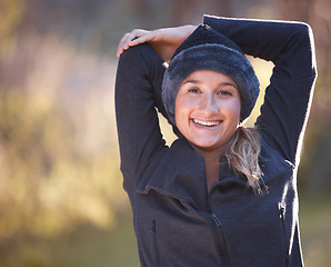 Image showing Hiking, portrait and mock up with a woman stretching outdoor for a hike in the woods, forest or nature. Fitness, warm up and a female hiker getting ready for a walk outside in the natural wilderness