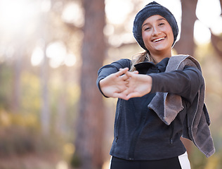 Image showing Hiking, portrait and mockup with a woman stretching in nature, outdoor for a hike in the woods or forest. Fitness, warm up and a female hiker getting ready for a walk outside in the wilderness