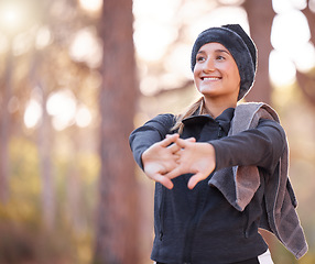 Image showing Hiking, stretching and mockup with a woman in nature, outdoor for a hike in the woods or forest. Fitness, warm up and a female hiker getting ready for a walk outside in the natural wilderness