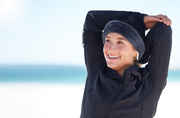 Image showing Fitness, woman and stretching arms on beach in preparation for exercise, cardio workout or training. Happy sporty female in warm up arm stretch getting ready for fun exercising by the ocean on mockup