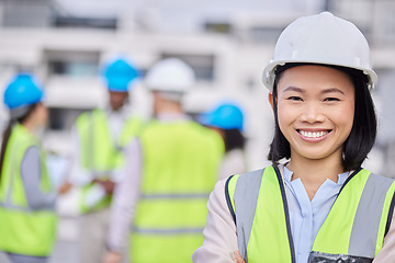 Image showing Engineering, leadership and portrait of a woman construction worker on an outdoor site. Confidence, happy and Asian female industry manager or foreman standing with crossed arms on a building plot.