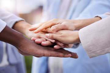 Image showing Team, doctors and stack hands for motivation, support and collaboration with trust, solidarity and diversity. Close up, hand together and doctor with teamwork, goals and help in healthcare at clinic