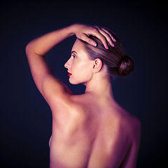 Image showing Beauty, sensual and back of woman in a studio with a cosmetic, makeup of self care routine. Beautiful, seductive and profile of a young female model with a sexy pose isolated by a black background.