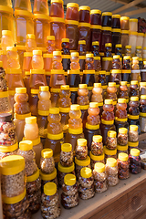 Image showing A lot of jars with natural organic honey