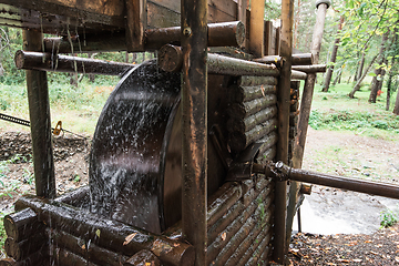 Image showing Rustic watermill with wheel