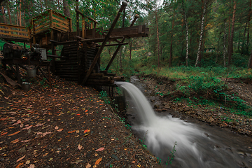 Image showing Rustic watermill with wheel