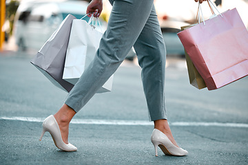 Image showing Shopping bags, woman customer and heels of a girl on a city street in New York with sale bag. Mall, retail fashion shop and store discount with a female walking outdoor after a luxury boutique visit