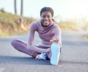 Image showing Running, stretching and portrait of black woman in road for jogging, workout and cardio exercise. Training, health and marathon with runner in street and legs warm up for wellness, sports and goal