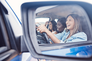 Image showing Happy, mirror and friends with women in car driving for road trip, vacation and transportation. Summer break, travel and smile with reflection of girl driver on holiday for journey, fun and weekend