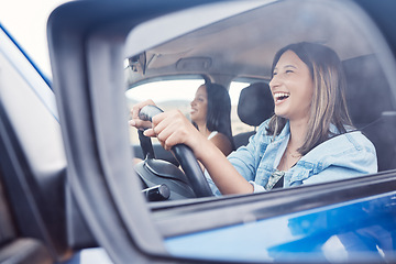 Image showing Travel, mirror and friends with women in car driving for road trip, vacation and transportation. Summer break, happy and smile with reflection of girl driver on holiday for journey, auto or direction