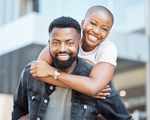 Image showing Piggyback, black couple and portrait in city for love, care and happiness on date together in Nigeria. Happy man carrying woman in urban street, town and outdoor for fun, freedom and relax with smile