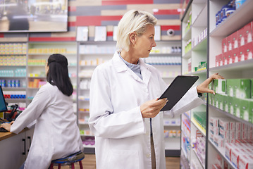 Image showing Pharmacy product, pharmacist woman and tablet for medicine management, stock research or inventory. Digital technology, retail logistics and senior medical doctor or person on pharmaceutical database