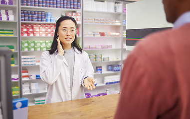 Image showing Pharmacy, help desk and pharmacist woman with customer service for neck pain, thyroid or medical support. Medicine, pharmaceutical and healthcare doctor or asian person muscle advice to sick client