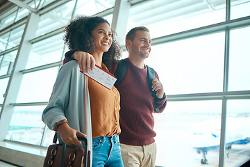 Image showing Travel, airport and happy couple with ticket or boarding pass for international flight for holiday destination together. Smile, woman and man with visa for travelling to foreign country for vacation.