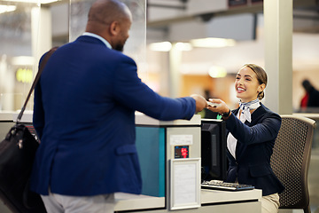 Image showing Businessman, airport and passenger assistant helping traveler with checkin at terminal counter. Black male with passport and service agent in travel help, security or immigration for airline control