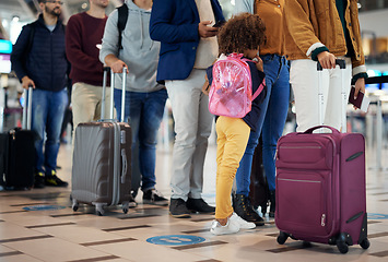 Image showing Airport, travel and people legs in queue for international vacation, holiday or immigration. Line, group and waiting with luggage, suitcase and bag for global flight, plane journey and check in gate