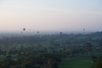 Image showing Hot air balloons over a golf course