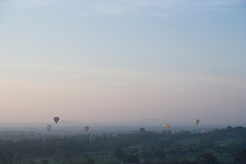 Image showing Golf course with hot air balloons