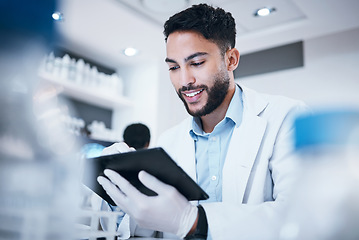 Image showing Science, smile and tablet with man in laboratory for medicine, pharmacy and healthcare vaccine. Medical, internet and technology with expert reading data for experiment, investigation and cure