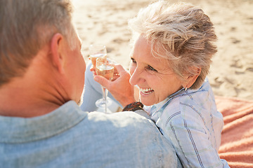 Image showing Champagne, senior beach couple laughing and love with mature care and support of marriage. Toast, wine and sea picnic of a old man and woman together on holiday in summer loving the sunshine outdoor