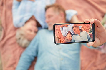 Image showing Relax, love and selfie with phone screen and old couple on picnic for bonding, anniversary and celebration. Happy, technology and picture with senior man and woman for health, social media and summer