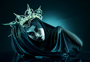 Image showing Veil, dark and fantasy with portrait of queen for evil makeup, fashion and horror art. Creative, mystery and fabric with woman and crown for spooky, elegant and nightmare in studio background