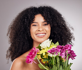 Image showing Wellness portrait or face of black woman or flowers in studio for health, luxury spa or self care. Aesthetic, beauty facial skincare or girl with plants for treatment, cosmetics product or nature