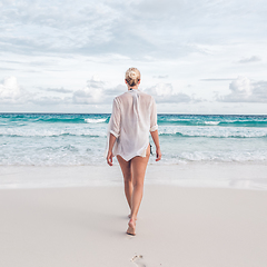 Image showing Woman on summer vacations at tropical beach of Mahe Island, Seychelles.