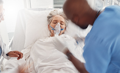Image showing Senior woman, oxygen mask and emergency in hospital bed, healthcare and doctors helping lady. Medical professionals, female patient and senior citizen with disease, illness and teamwork to assist