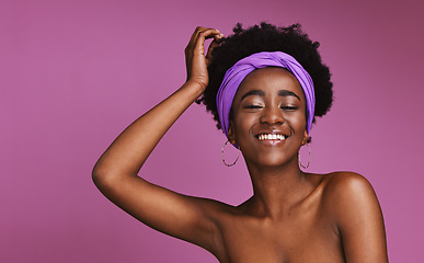 Image showing Portrait, beauty and mockup with a model black woman on a purple background in studio for natural skincare. Face, hair and headband with a young afro female posing to promote cosmetic treatment