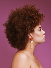 Image showing Woman, profile or afro hairstyle on isolated purple background in empowerment, curly maintenance or skincare salon promotion. Beauty model, natural or hair growth texture on cosmetics studio backdrop