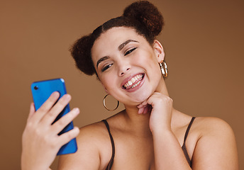 Image showing Selfie, happiness and woman smile with a phone feeling excited, happy and beauty for profile picture. Social media, isolated and studio background with mockup of gen z, young and face of young person