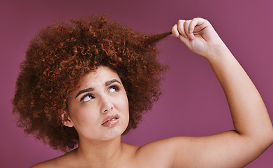 Image showing Face stress, hair loss or afro on beauty studio background in grooming, texture anxiety or fail. Woman, hand or natural hairstyle with damage, split ends or frizzy knot on isolated skincare backdrop