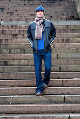 Image showing Handsome man walking stairs