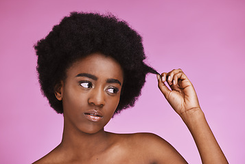 Image showing Natural, hair and black woman with afro in studio for beauty, wellness and grooming on purple background. Haircare, hairstyle and face of girl model relax in luxury, hygiene or routine isolated