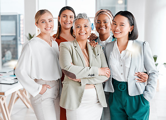 Image showing Portrait, diversity and business women support, teamwork and group empowerment for office leadership. Career hug and solidarity of asian, black woman and senior people or employees at global company