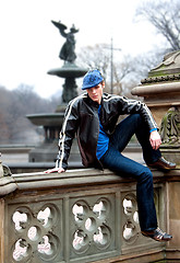 Image showing Handsome man on railing