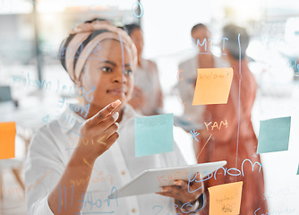 Image showing Planning, thinking or black woman for brainstorming on tablet with sticky notes, planning or creative idea on glass wall. Focus, teamwork or business meeting with writing, reading or work schedule