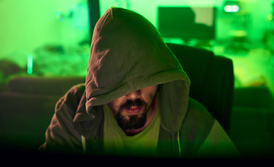 Image showing Computer hacker, hoodie or neon man hacking database software, online server or password phishing. Green ransomware developer, cybersecurity programming or hidden night programmer coding malware code