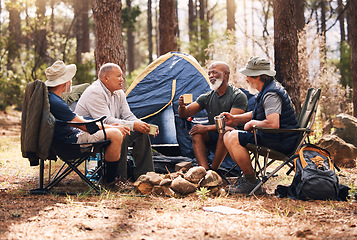 Image showing Man, friends and camping in nature with coffee for travel, adventure or summer vacation together on chairs by tent in forest. Group of men relaxing, talking or enjoying natural camp by trees outdoors