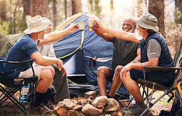 Image showing Man, friends and camping with cheers to coffee in nature for travel, adventure or summer getaway on chairs by tent in forest. Group of men relaxing and drinking in celebration for outdoor camp