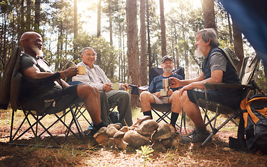 Image showing Senior people, friends and camping with coffee in nature for travel, adventure or summer vacation on chairs in forest. Group of elderly men relax, talking or enjoying camp out by trees in the woods