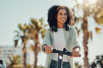 Image showing black woman, scooter or ebike for city travel while thinking about idea for eco friendly lifestyle. Happy model person on future electric bike for environment and carbon footprint on road in Miami