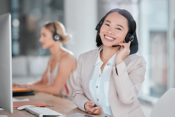 Image showing Asian woman, call center and portrait smile for telemarketing, customer support or service at office desk. Happy female consultant or agent smiling in contact us for desktop advice, help or sales