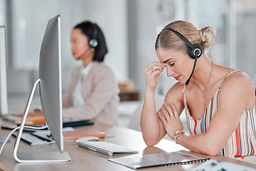 Image showing Headache, stress and burnout woman in call center feeling pain, tired or exhausted. Customer service, mental health and female sales agent with depression, anxiety or migraine in office workplace.