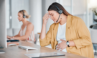 Image showing Telemarketing, stress and headache, pregnant woman at desk, hand on stomach, exhausted in office with headset. Burnout, pain and pregnancy, telemarketing consultant with anxiety from deadline time.