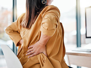 Image showing Fatigue, hands and back pain injury in call center feeling tired or exhausted in office workplace. Telemarketing, burnout and woman or female sales agent with fibromyalgia, inflammation or arthritis.