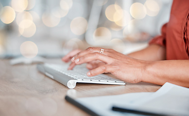 Image showing Hands, computer keyboard and typing in office, working on email or project at workplace. Bokeh, desktop and business woman on pc keypad writing report, planning or research while internet browsing.