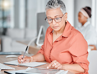 Image showing Tablet, book and business woman writing, research or internet browsing in office workplace. Technology, notebook and senior female employee with touchscreen for taking notes and planning strategy.