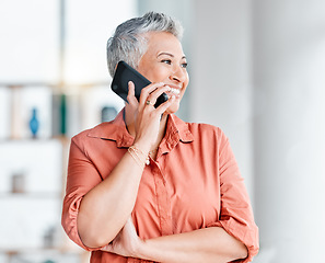 Image showing Business, office and senior woman on a phone call for discussion, client networking and client connection. Communication, technology and female ceo speaking, talking and in conversation on smartphone